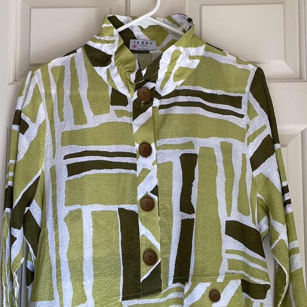 Colorful,abstract designed tunic, size L. Purchased in California boutique.